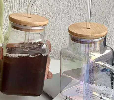 lid cup with wooden cover and straw