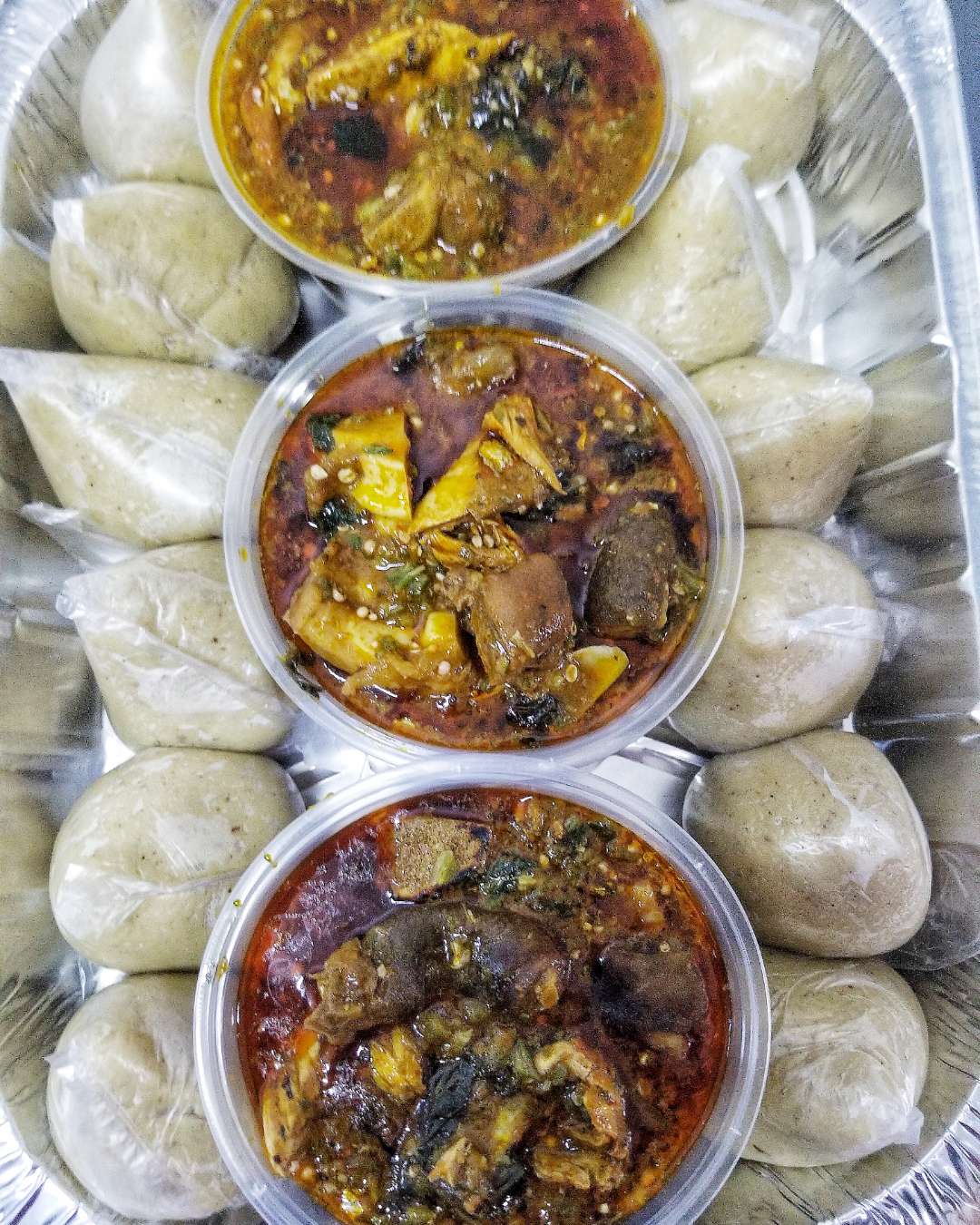 Banku with Goat Meat and Okro Stew