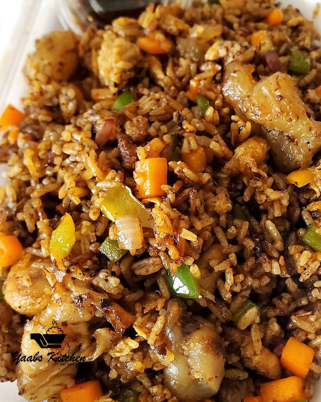 Assorted Jollof Rice with Beef and chicken breast.