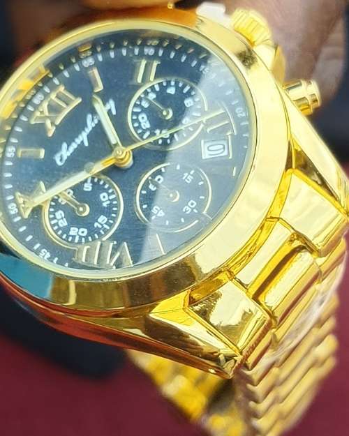Golden wrist watch