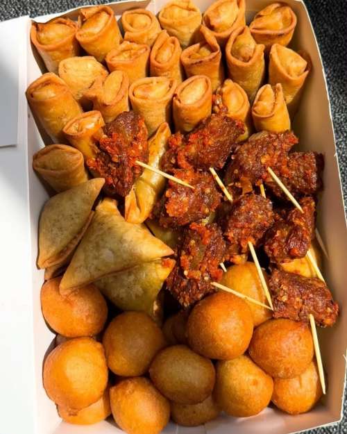 samosa, spring roll, puff-puff and meat