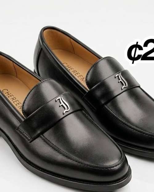 Chereen Black Loafers with Metallic Emblem
