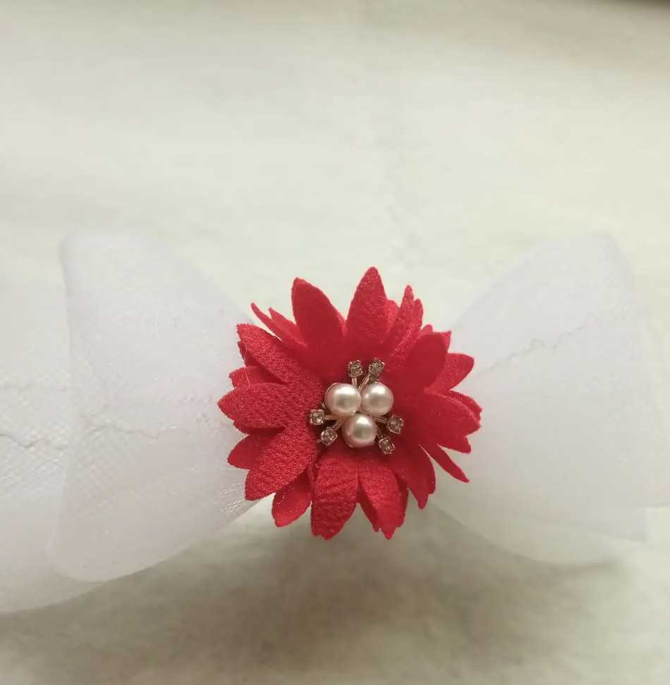 Triple bow clip embellished with flower